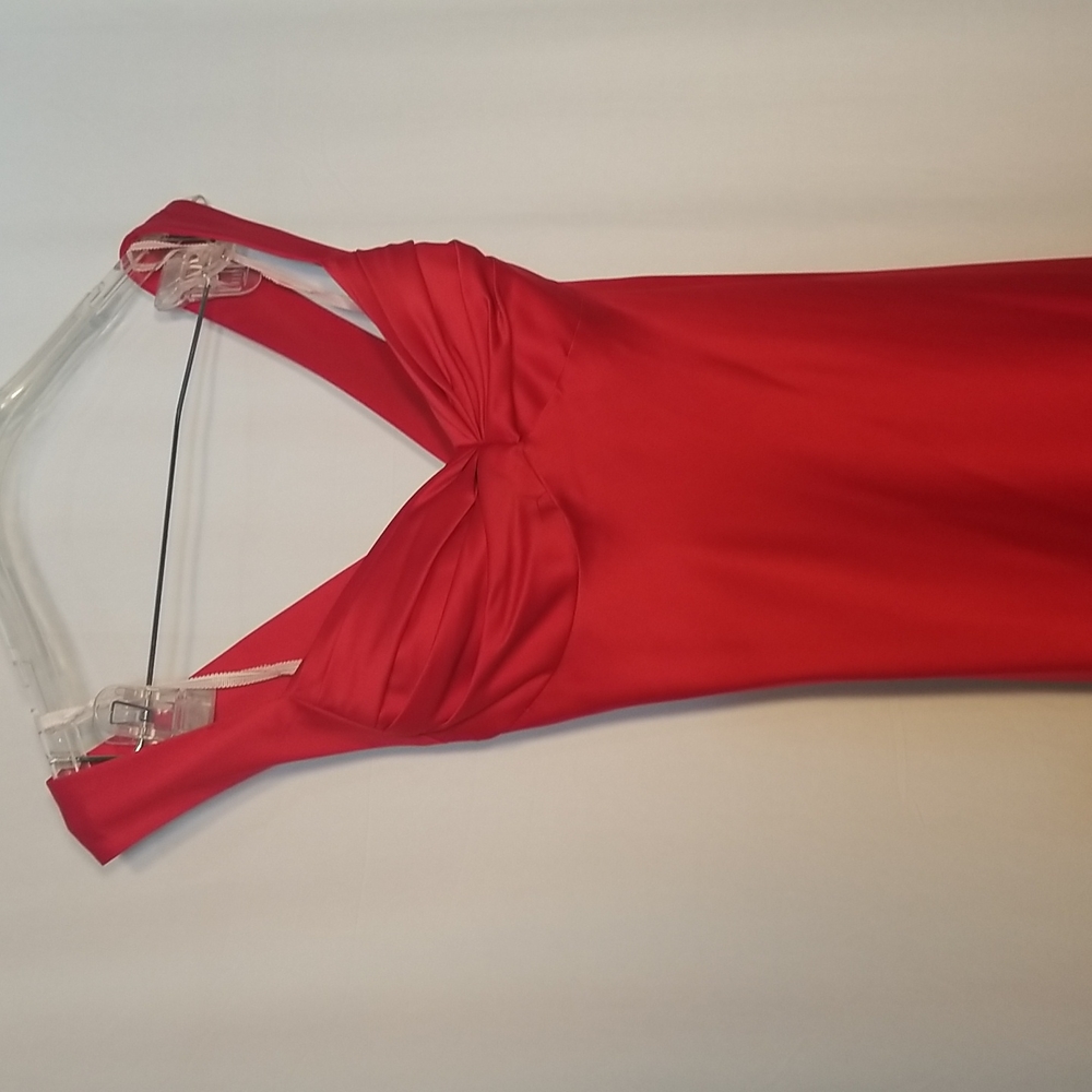 Red satin symmetrical crisscross back.